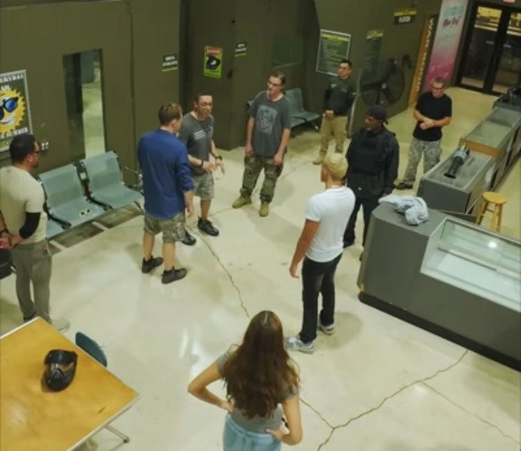 Male student learning to load a handgun at 3B Tactical range in Miami, FL