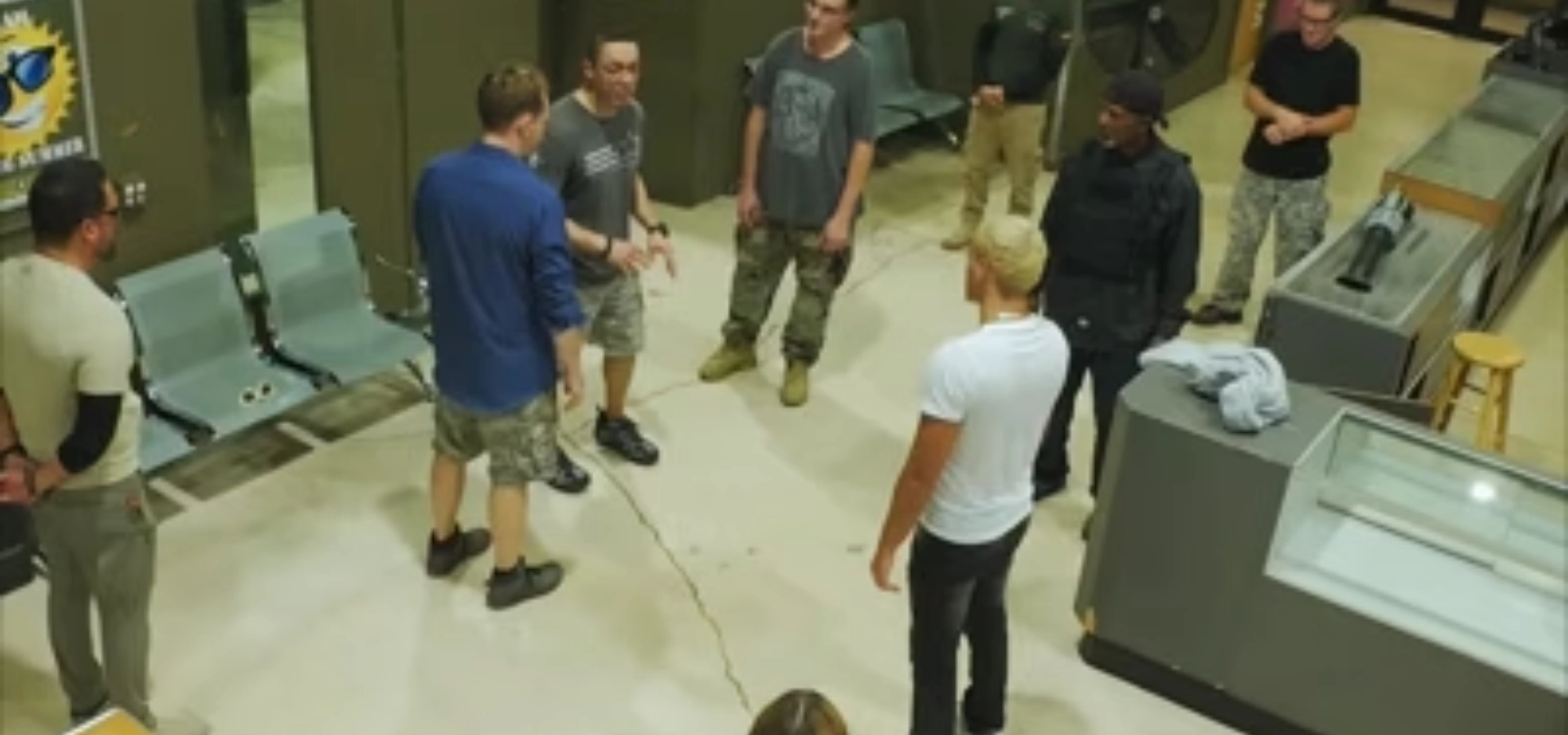 Male student learning to load a handgun at 3B Tactical range in Miami, FL
